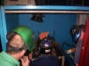 Instructor Demonstrating Welding Technique to Students